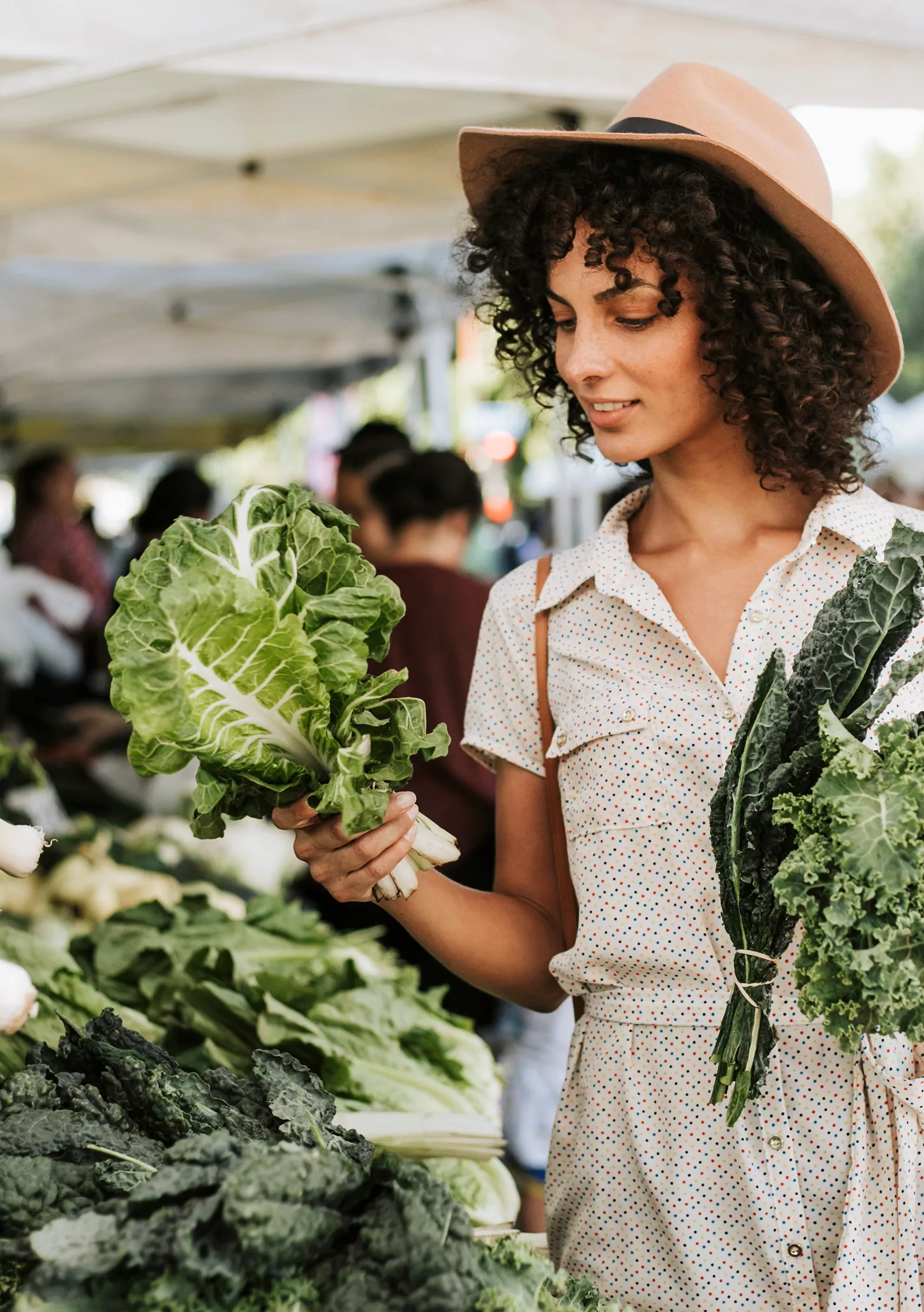 Woman holding lettuce